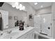 Modern bathroom featuring double sinks, a large mirror, and a glass-enclosed shower at 757 Carson Ln, Greenfield, IN 46140