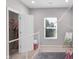 bedroom with playhouse-style bed, view of a large window, and a closet at 757 Carson Ln, Greenfield, IN 46140