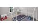 bedroom with a playhouse-style bed frame, toys, and a table for creative activities at 757 Carson Ln, Greenfield, IN 46140