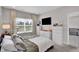 Comfortable bedroom with a view, large window, and neutral décor for a serene space at 757 Carson Ln, Greenfield, IN 46140