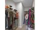 Walk-in closet with organized hanging racks and ample storage space for clothing at 757 Carson Ln, Greenfield, IN 46140