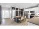 Open-concept kitchen and dining area featuring modern appliances, white cabinetry, and a spacious layout at 757 Carson Ln, Greenfield, IN 46140