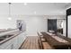 Bright kitchen and dining area featuring a long island with sink and seating at 757 Carson Ln, Greenfield, IN 46140