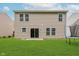 Spacious backyard with lush green grass and a trampoline at 8248 Ossian Ct, Camby, IN 46113