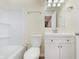 Clean bathroom with white vanity, toilet, and shower/tub combination at 8248 Ossian Ct, Camby, IN 46113