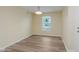 Sunny dining room featuring new floors and a modern light fixture at 8248 Ossian Ct, Camby, IN 46113