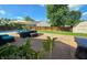 Backyard patio with a pool, lounge seating, umbrella, and an outdoor shed at 8460 Ferguson Cir, Avon, IN 46123