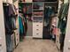 Walk in closet with ample storage shelving, perfect for organization at 8460 Ferguson Cir, Avon, IN 46123