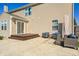 Backyard patio area with comfortable wicker furniture and sliding glass doors at 8557 Vyners Ln, Avon, IN 46123