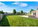 Enjoy a large backyard with lush lawn and patio seating, ideal for entertaining or relaxing outdoors at 8557 Vyners Ln, Avon, IN 46123