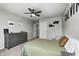 Spacious bedroom with carpet, ceiling fan, and decorated with a theme at 8557 Vyners Ln, Avon, IN 46123