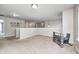Spacious upstairs bonus room features neutral carpeting, light gray walls, and a textured ceiling at 8557 Vyners Ln, Avon, IN 46123