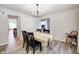 Contemporary dining room with modern lighting, table and chairs at 8557 Vyners Ln, Avon, IN 46123
