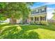 Charming two-story home with a well-manicured lawn and inviting front porch at 8557 Vyners Ln, Avon, IN 46123