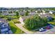 Aerial view showcasing a well-maintained backyard, a patio, and an attached two-car garage at 8557 Vyners Ln, Avon, IN 46123