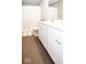 Neutral bathroom featuring double vanity with wood-look tile floors at 9309 Kellner St, Pendleton, IN 46064