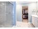 Elegant bathroom with glass enclosed shower and a walk in closet at 9309 Kellner St, Pendleton, IN 46064