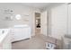 Bright Bedroom featuring white dresser, glider, and peaceful decor, creating a calming environment at 9309 Kellner St, Pendleton, IN 46064