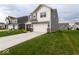 Beautiful two-story home featuring an attached two-car garage, neutral siding, and a well-manicured lawn at 9309 Kellner St, Pendleton, IN 46064