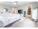 Airy primary bedroom features a walk-in closet and ensuite bathroom at 9309 Kellner St, Pendleton, IN 46064