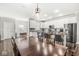 Spacious kitchen with white cabinets, stainless steel appliances, granite countertops, and an island with bar seating at 10814 Matherly Way, Noblesville, IN 46060