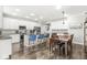 Bright kitchen featuring white cabinets, granite countertops, stainless appliances, and eat in bar area at 10814 Matherly Way, Noblesville, IN 46060
