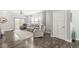 Comfortable living room with neutral walls, plush seating, and sliding glass doors providing a relaxing atmosphere at 10814 Matherly Way, Noblesville, IN 46060