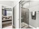 Main bathroom featuring glass shower stall and view into main bedroom at 10814 Matherly Way, Noblesville, IN 46060