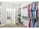 Spacious walk-in closet with custom shelving and plenty of room for storage at 10814 Matherly Way, Noblesville, IN 46060