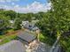 Aerial view of a well-maintained home with a large garage and a beautiful, spacious yard at 11315 House St, Indianapolis, IN 46259
