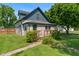 Charming home featuring stone accents, a cozy front porch, and mature landscaping at 11315 House St, Indianapolis, IN 46259