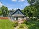 Exterior elevation showing a charming home with a cozy front deck and well-manicured lawn at 11315 House St, Indianapolis, IN 46259