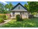 Charming home featuring stone accents, a cozy front porch, and a well-maintained lawn at 11315 House St, Indianapolis, IN 46259
