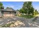 Detached two-car garage with a basketball hoop in the driveway at 11315 House St, Indianapolis, IN 46259
