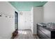 This hallway features a modern changing table and access to the outside at 11315 House St, Indianapolis, IN 46259