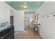 This hallway features a breakfast bar and access to the outside at 11315 House St, Indianapolis, IN 46259