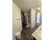 Bathroom featuring a tub-shower combo with patterned shower curtain and wood-look flooring at 12536 Teacup Ne Way, Indianapolis, IN 46235