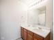 Bathroom featuring a double sink vanity with white countertops and wood cabinetry at 12847 Arvada Pl, Fishers, IN 46038