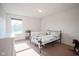 Bright bedroom with a twin bed, dresser and a horse rocker at 12847 Arvada Pl, Fishers, IN 46038
