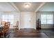 Bright foyer with stylish hardwood floors and a welcoming ambiance at 12847 Arvada Pl, Fishers, IN 46038
