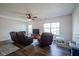 Cozy living room with plush seating and ample natural light at 12847 Arvada Pl, Fishers, IN 46038