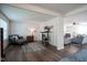 Spacious living room with fireplace and views into other living areas at 12847 Arvada Pl, Fishers, IN 46038