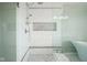 Modern bathroom featuring a glass-enclosed shower with white and gray tiled walls at 12847 Arvada Pl, Fishers, IN 46038