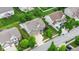 Inviting home nestled among lush landscaping, highlighting the curb appeal and neighborhood charm at 12997 Bartlett Dr, Fishers, IN 46037