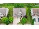 Expansive home with a well-manicured lawn, mature trees, and a spacious driveway at 12997 Bartlett Dr, Fishers, IN 46037