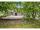 Private backyard with a concrete patio and partial view of the house at 12997 Bartlett Dr, Fishers, IN 46037