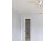Simple bedroom with a ceiling fan and a door ajar at 12997 Bartlett Dr, Fishers, IN 46037