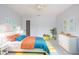 Cozy bedroom featuring a bed, colorful decor, and a ceiling fan at 12997 Bartlett Dr, Fishers, IN 46037