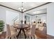 Dining room with hardwood floors, neutral walls, and furniture at 12997 Bartlett Dr, Fishers, IN 46037