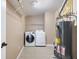 A laundry room with washer, dryer and water heater at 12997 Bartlett Dr, Fishers, IN 46037